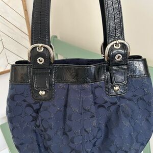Coach gently used purse, beautiful blue fabric with black trim